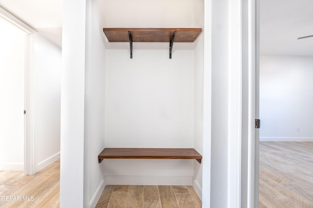 spacious closet featuring light hardwood / wood-style floors