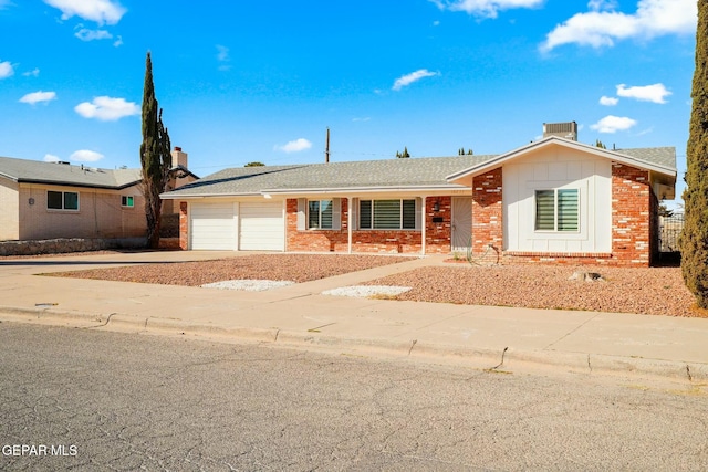 single story home with a garage