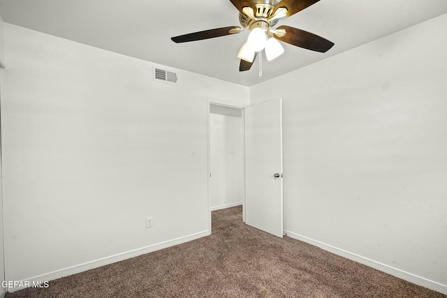 unfurnished room featuring carpet flooring and ceiling fan