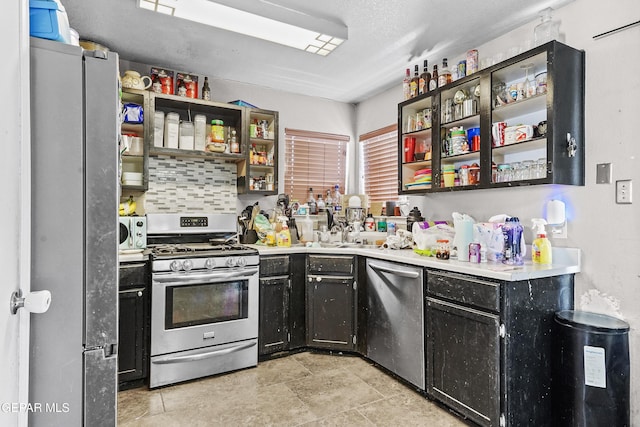 kitchen featuring backsplash and stainless steel appliances