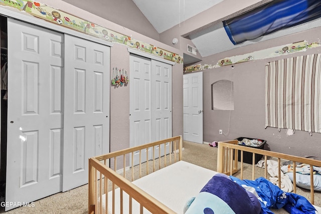 bedroom featuring lofted ceiling