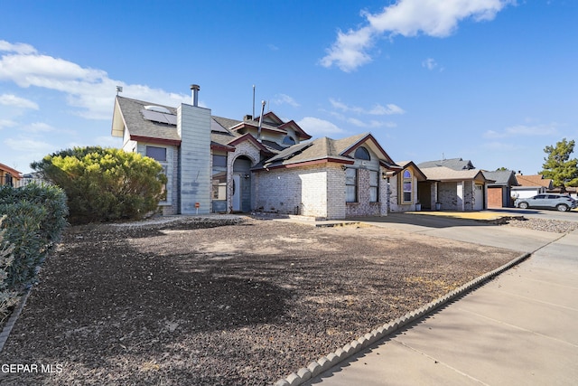 view of front of home with solar panels