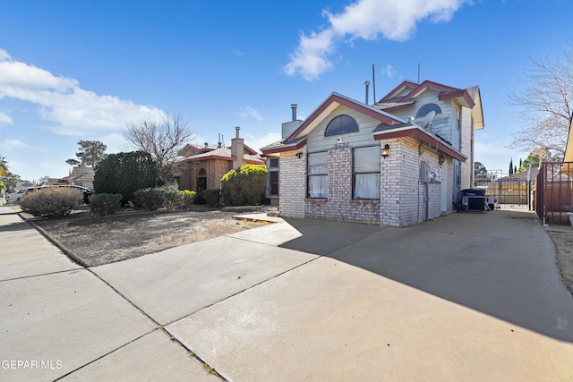 view of home's exterior featuring central AC