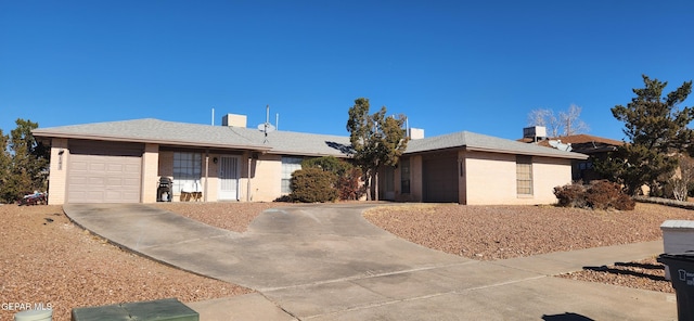 single story home with a garage