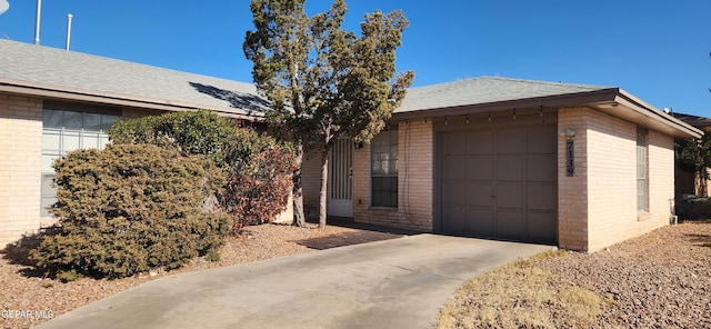 view of side of property featuring a garage