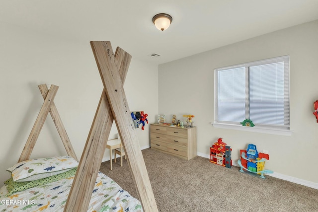 bedroom with light carpet