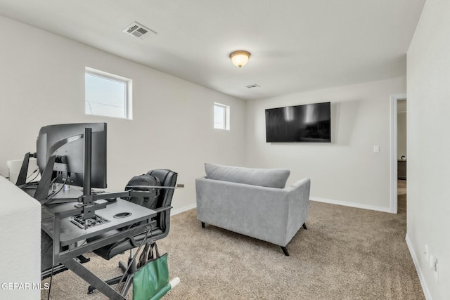 carpeted office featuring a healthy amount of sunlight