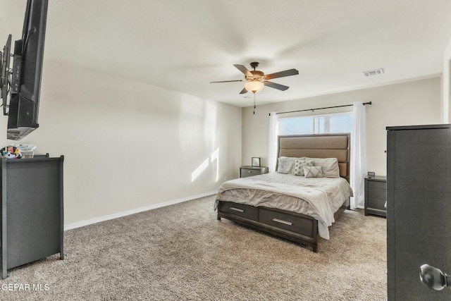 bedroom featuring light carpet and ceiling fan