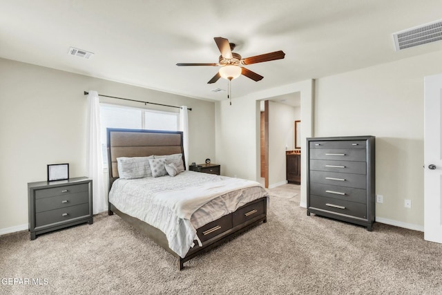 carpeted bedroom featuring ceiling fan and connected bathroom