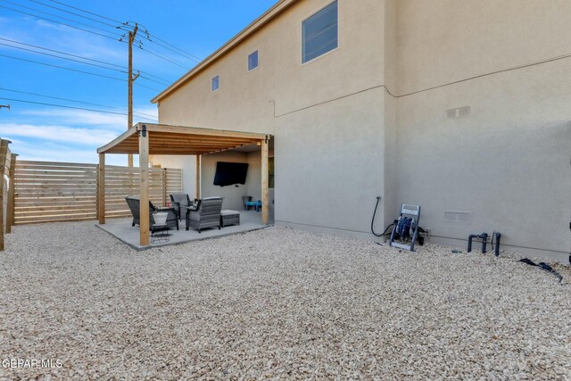 rear view of house with a patio