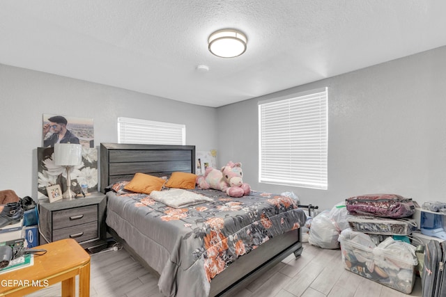 bedroom with a textured ceiling