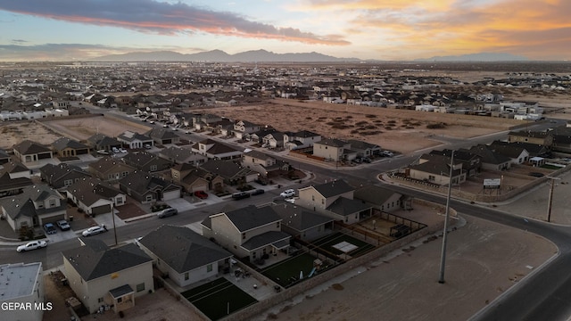 aerial view at dusk with a mountain view