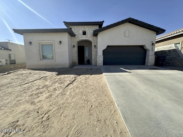 view of front of home with a garage