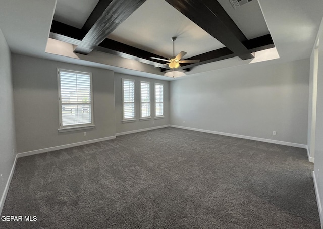 carpeted spare room featuring ceiling fan, coffered ceiling, and beam ceiling