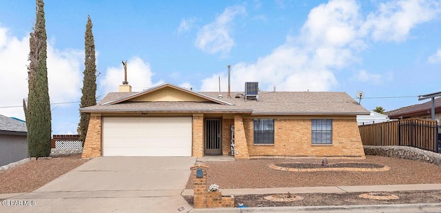 ranch-style home with a garage