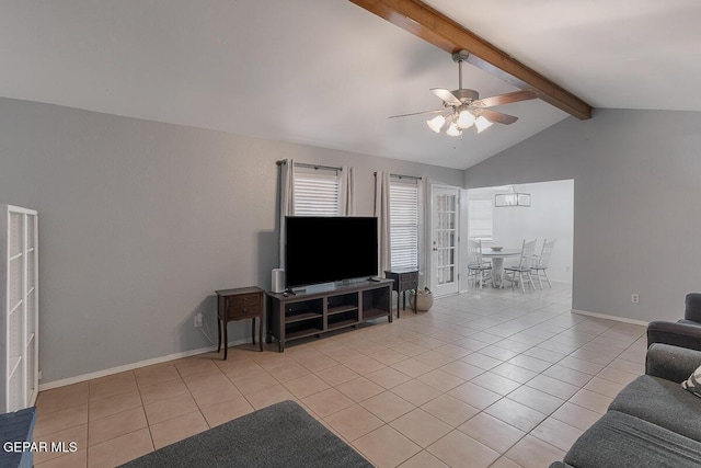 living room featuring vaulted ceiling with beams, ceiling fan, and light tile patterned floors