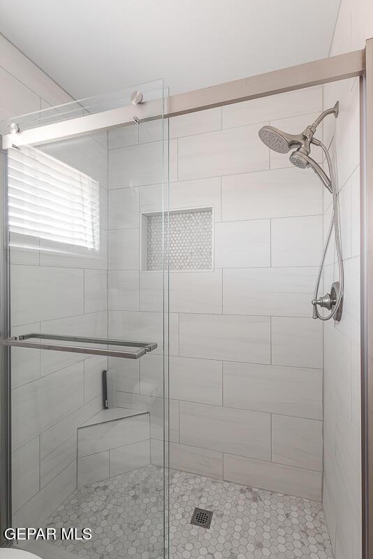 bathroom with walk in shower