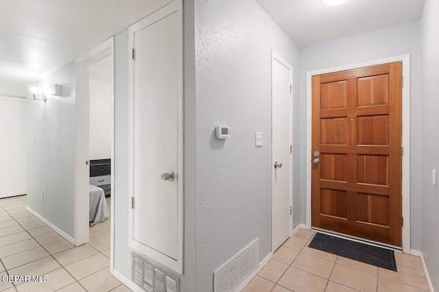 interior space with light tile patterned flooring