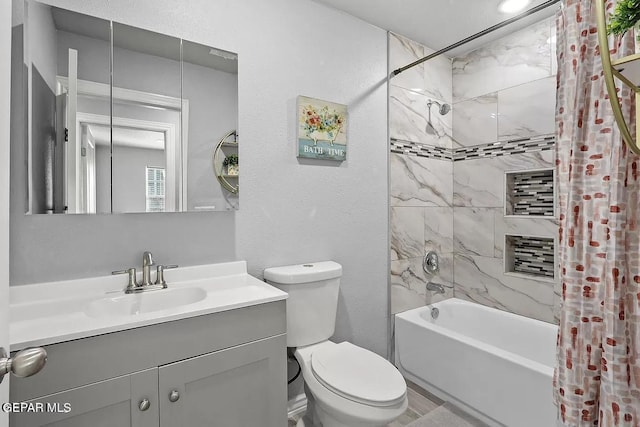 full bathroom with vanity, toilet, and shower / bath combo