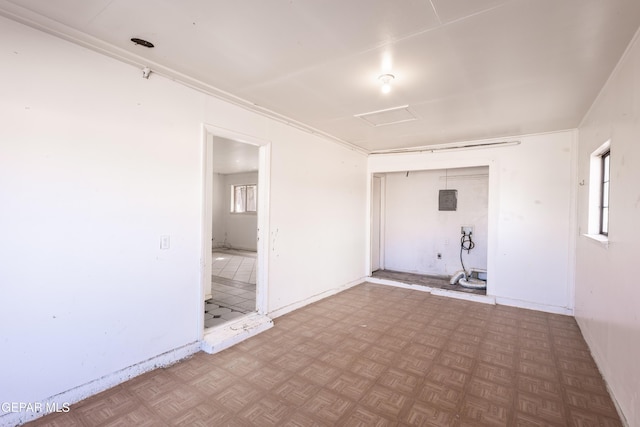 unfurnished room featuring parquet floors