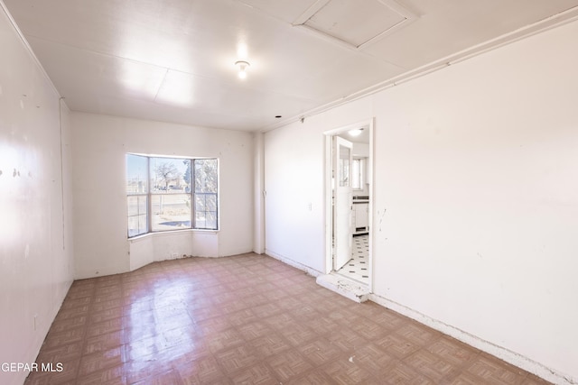 unfurnished room featuring light parquet floors