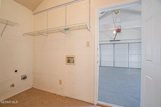 laundry room featuring electric dryer hookup and washer hookup