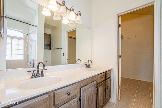 bathroom with vanity and tile patterned flooring