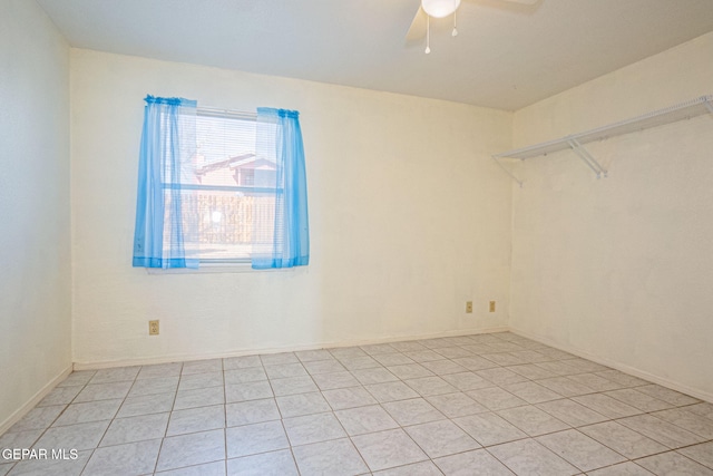 unfurnished room featuring ceiling fan