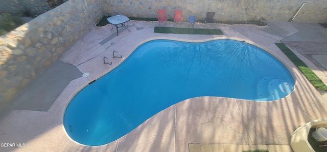 view of pool with a patio