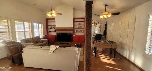 tiled living room with high vaulted ceiling, a fireplace, and ceiling fan