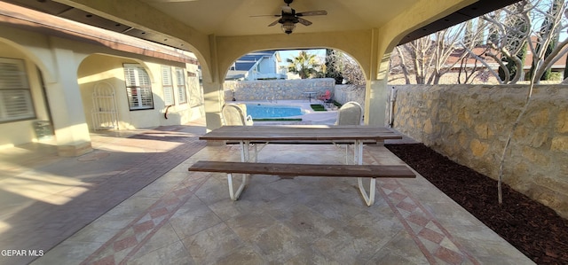 view of patio / terrace with ceiling fan