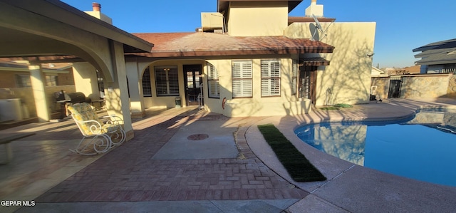 view of pool with a patio area