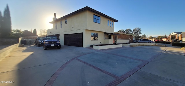 exterior space with a garage