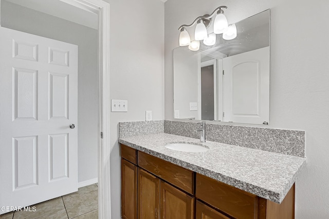 bathroom with vanity and tile patterned floors