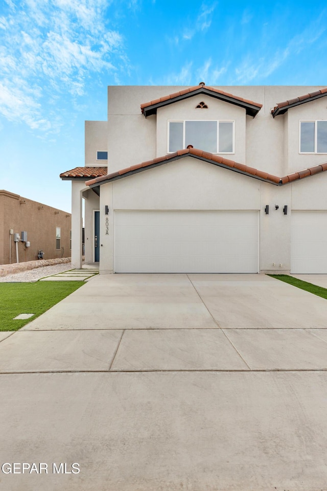 view of front of property featuring a garage