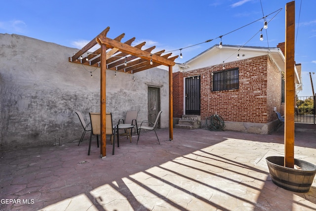 view of patio featuring a pergola