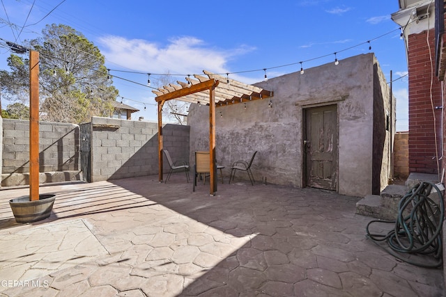 view of patio / terrace featuring a pergola