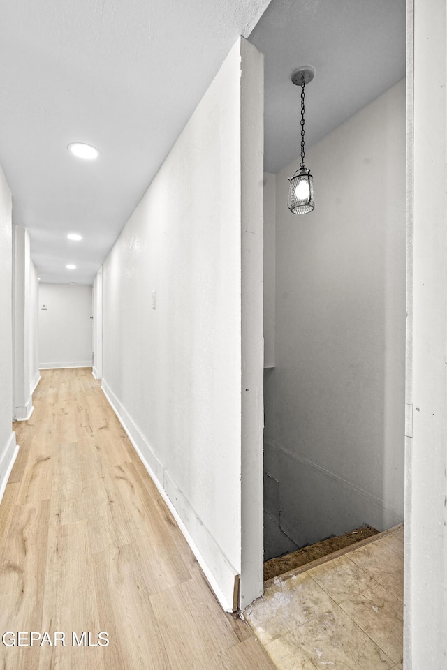 hallway featuring hardwood / wood-style floors