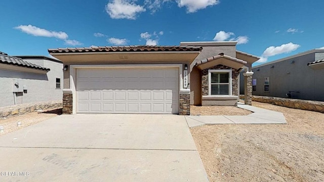 13749 Lorenz Ave, El Paso, TX 79928 - view of front of home with a garage