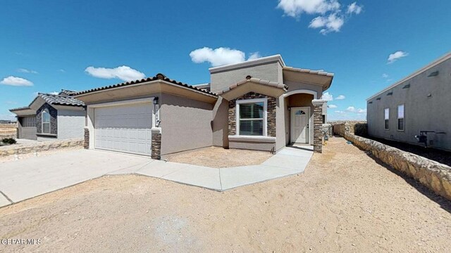 13749 Lorenz Ave, El Paso, TX 79928 - view of front of home featuring a garage
