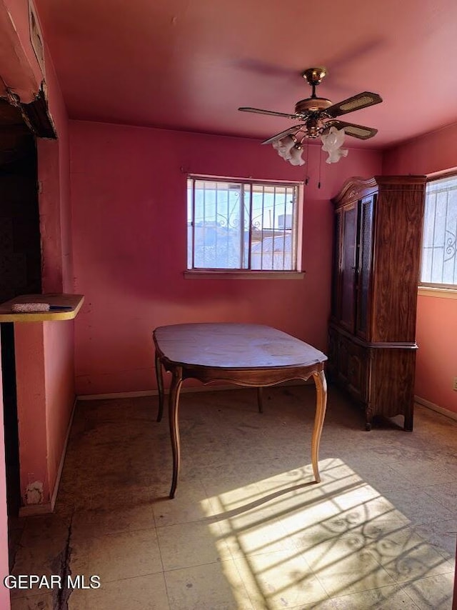 dining room with ceiling fan