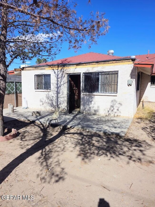 view of front of property with a patio area