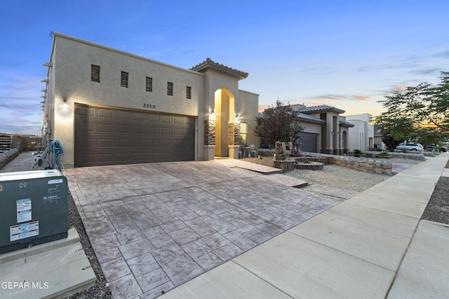 view of front of property featuring a garage