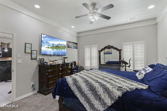 carpeted bedroom with ceiling fan