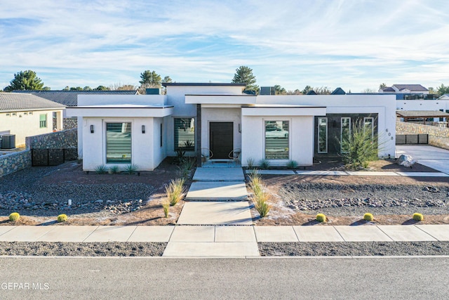 view of front of home with cooling unit