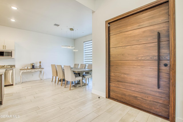 interior space featuring light wood-type flooring