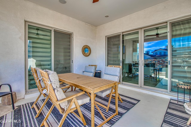 view of patio featuring ceiling fan