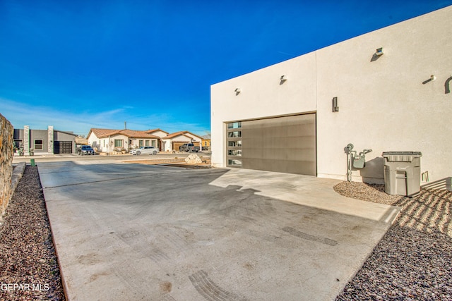 view of property exterior featuring a garage