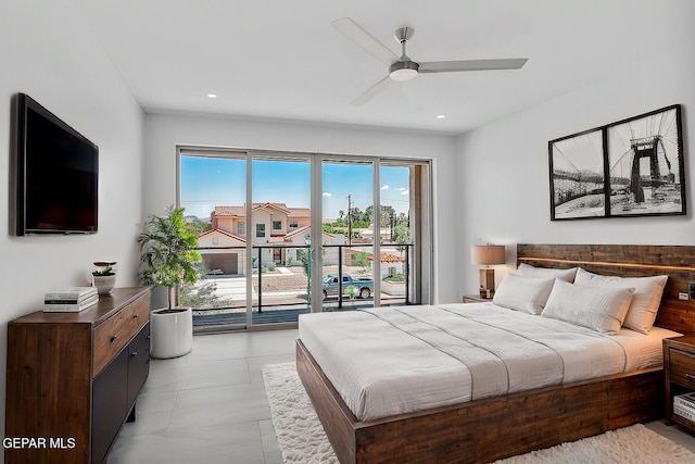 bedroom featuring multiple windows, access to exterior, and ceiling fan