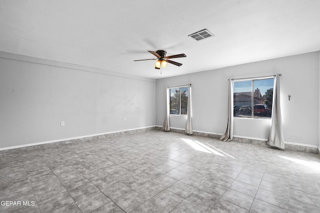 unfurnished room featuring ceiling fan